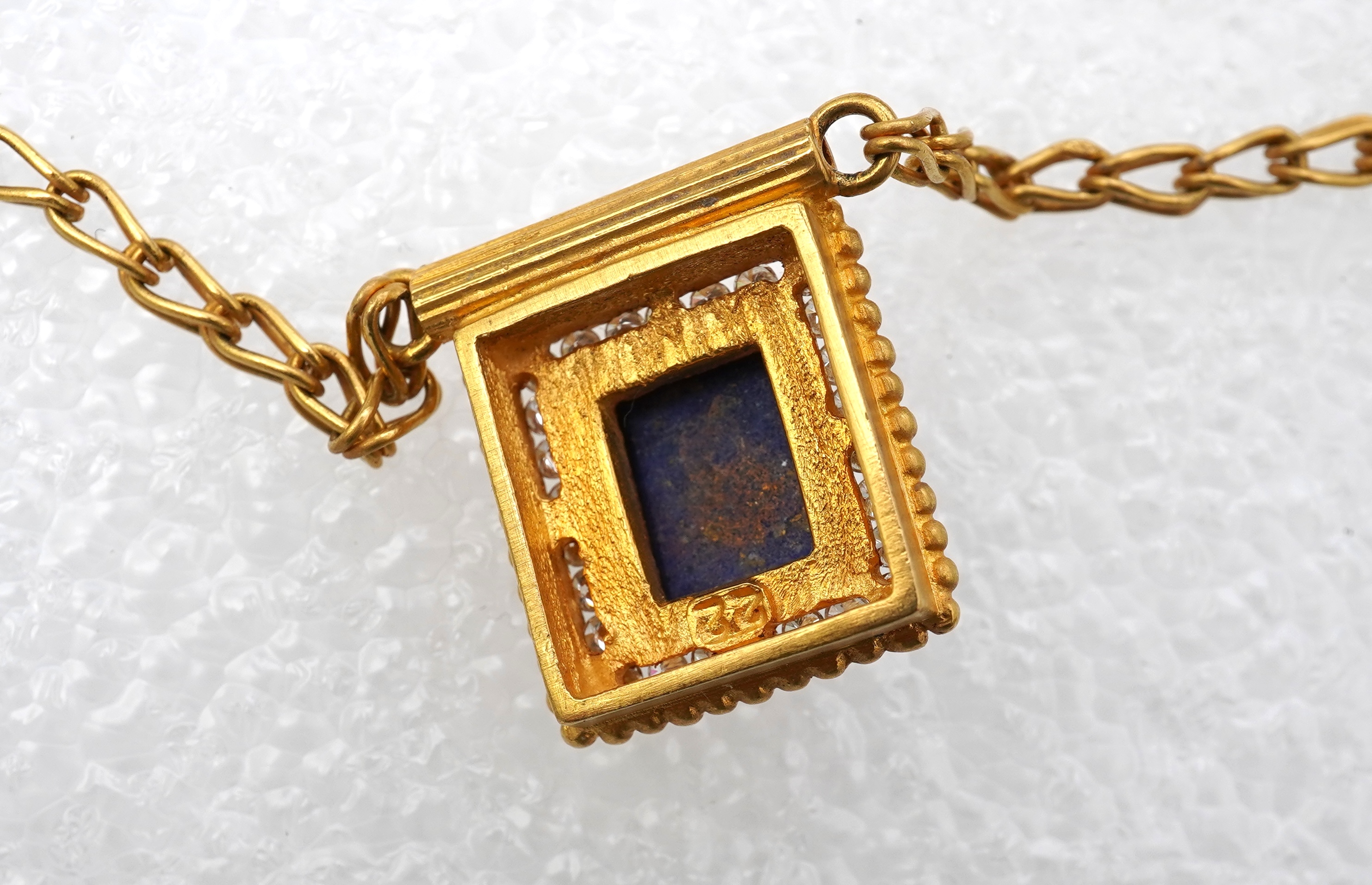 A lapis lazuli, gold and diamond demi-parure